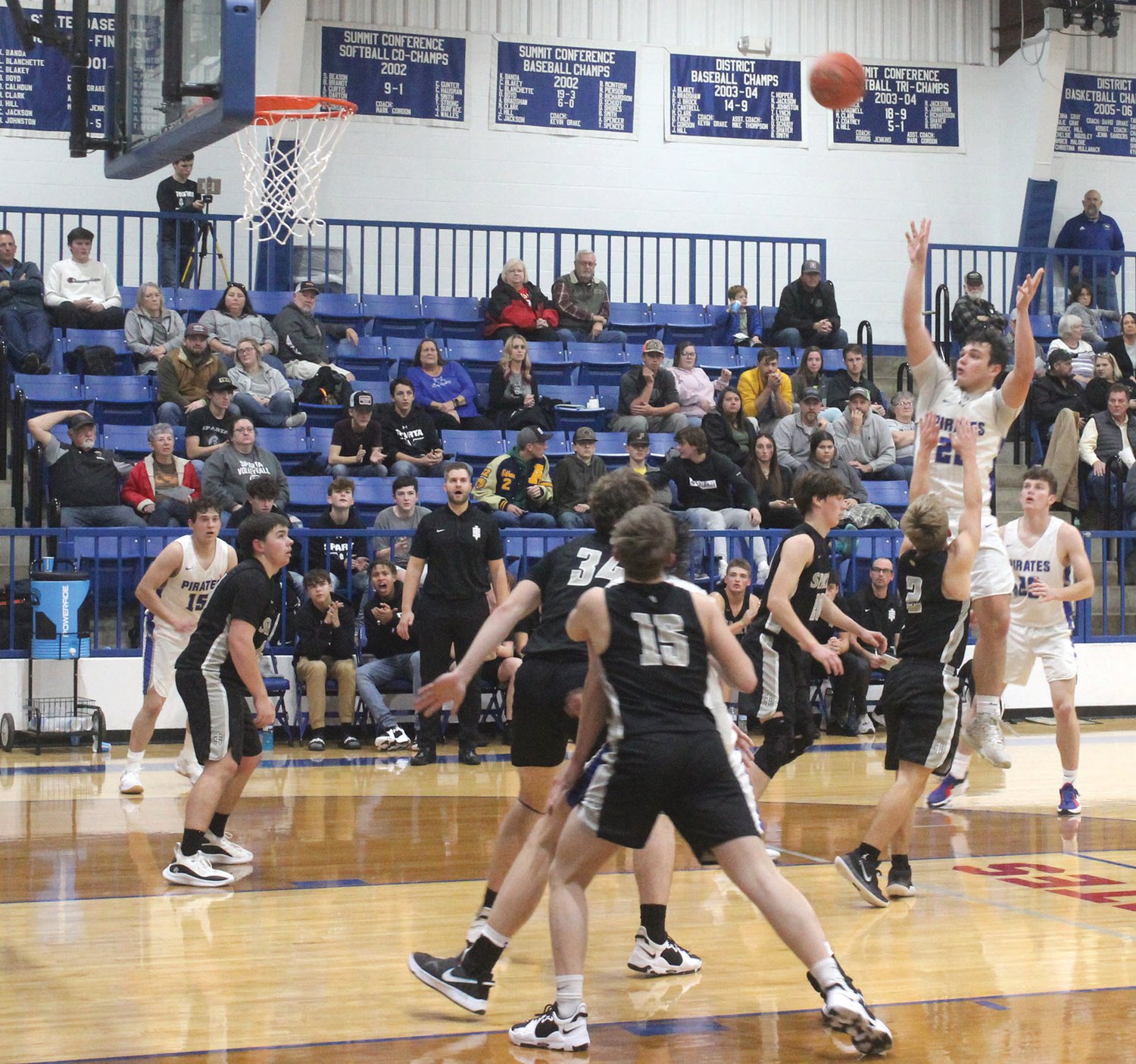 Norwood’s Gavin McGraw puts up a shot in the season opener against Sparta.